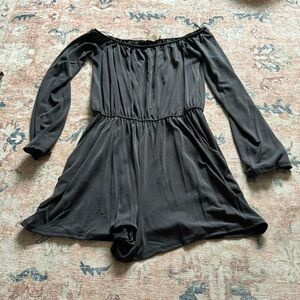 Women’s black long sleeve romper with pockets